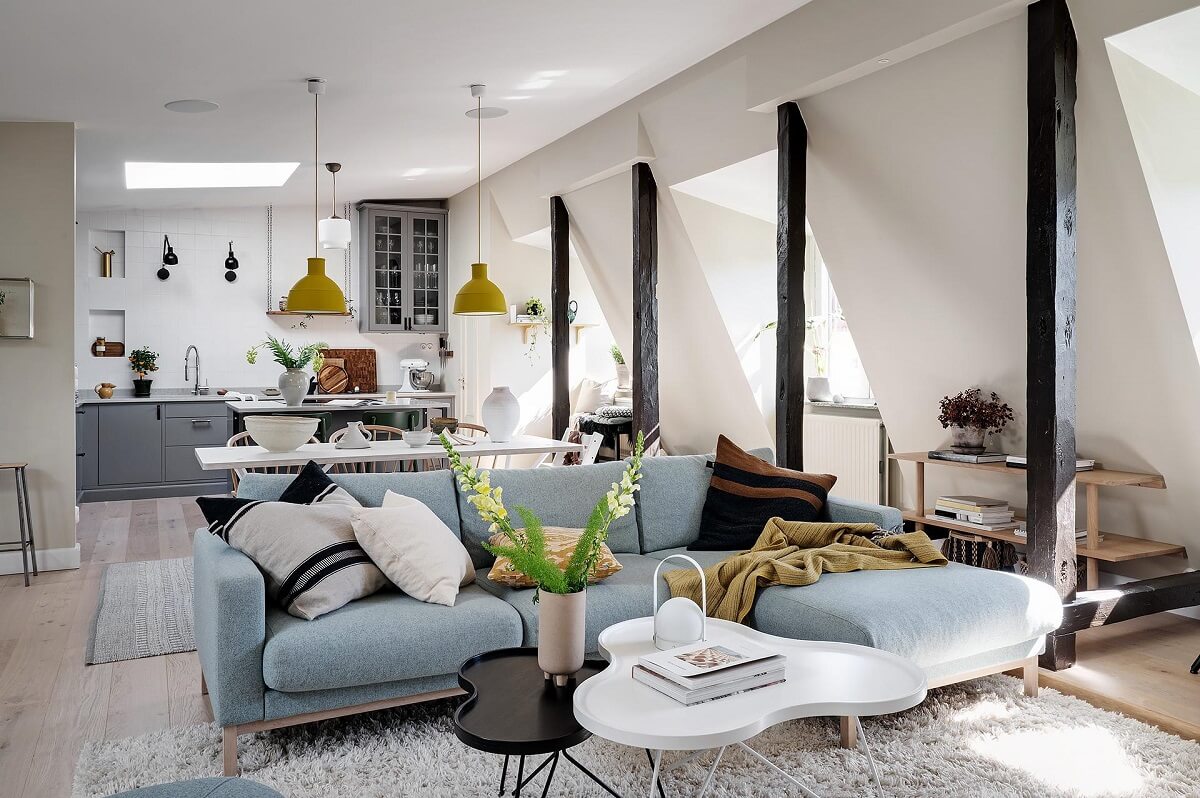 A Modern Scandinavian Attic Apartment 14 modern-scandinavian-living-room-kitchen-wooden-beams-nordroom