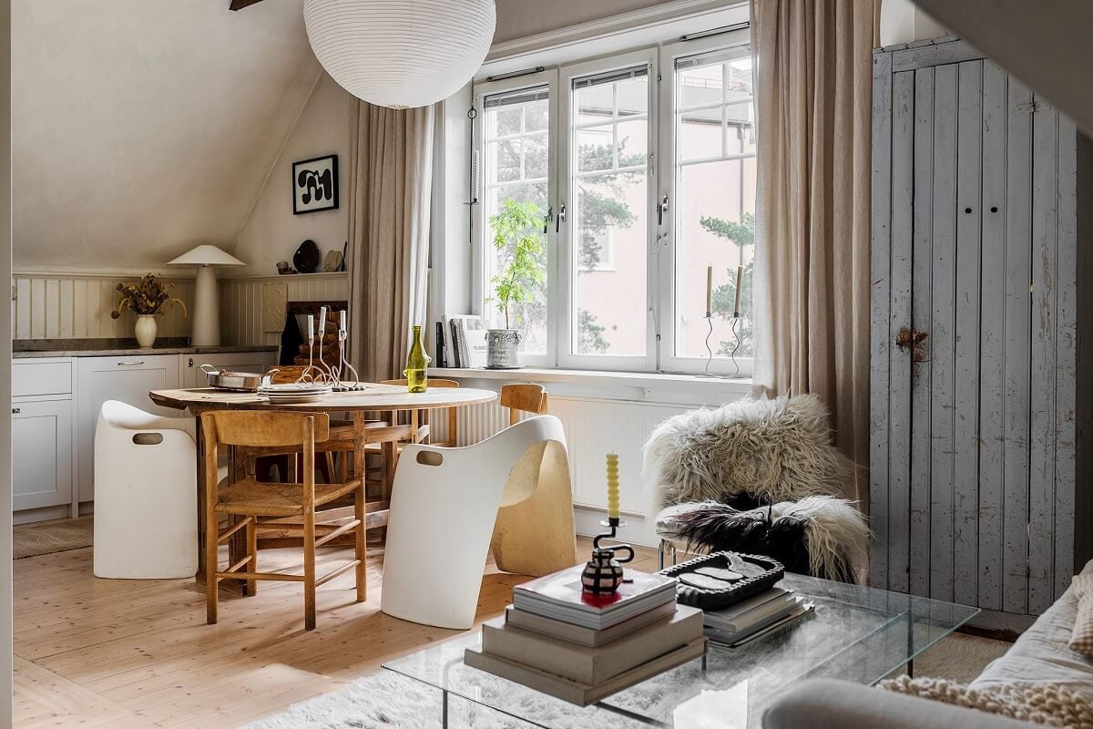 A Charming Attic Apartment with High Ceilings 6 open-plan-kitchen-living-room-neutral-colors-nordroom