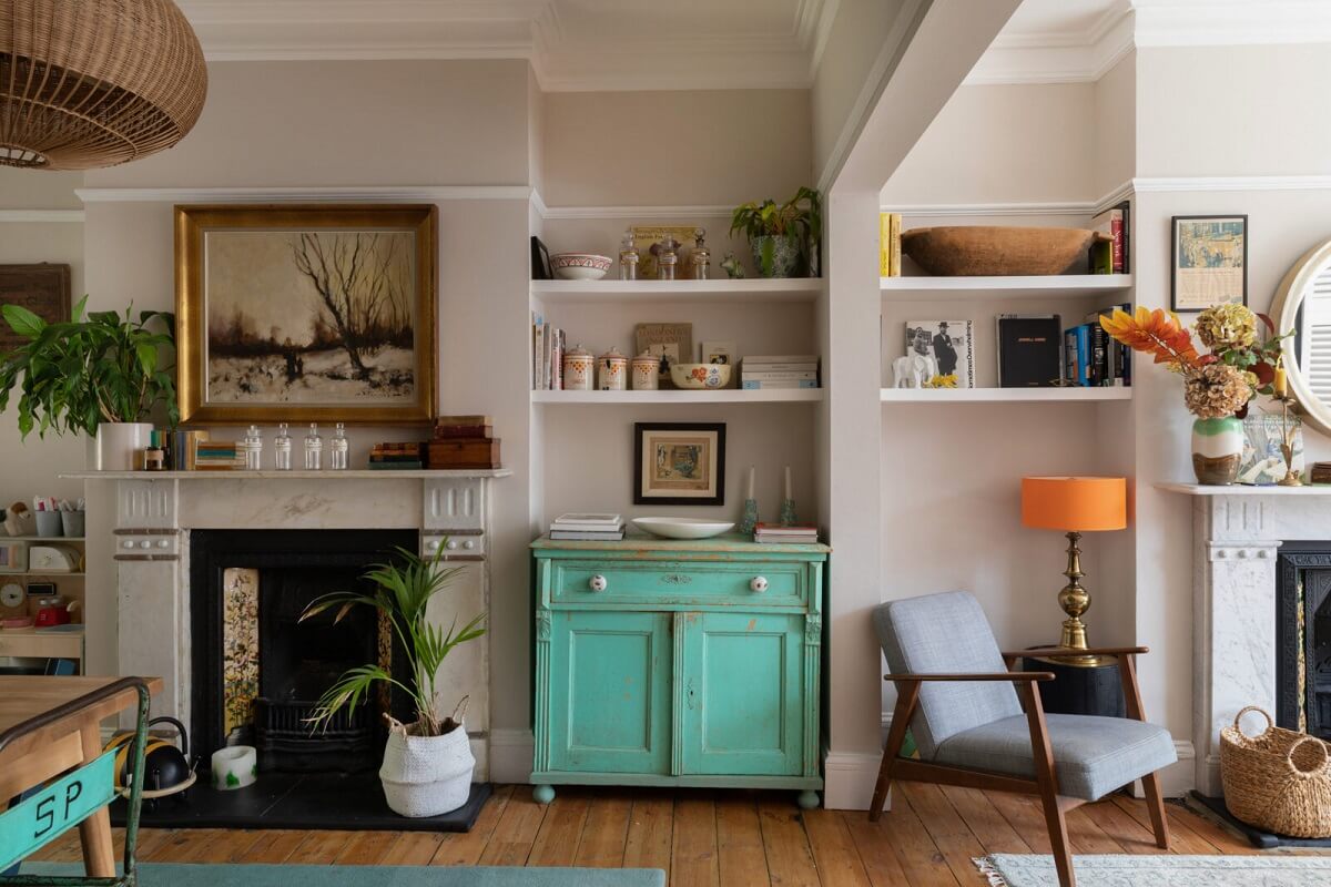 Colorful Rooms in a Family Home in London 4 open-plan-living-room-dining-space-fireplace-wooden-floor-built-in-shelves-nordroom