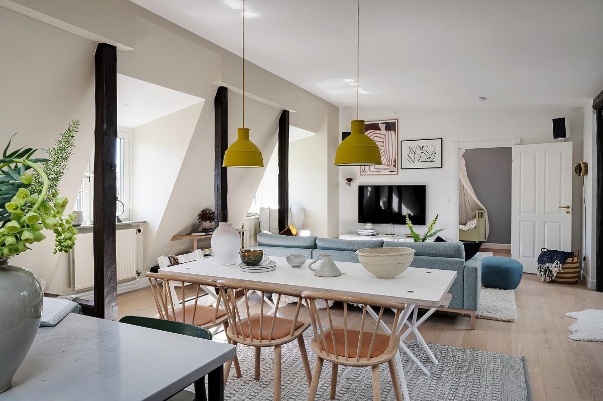 A Modern Scandinavian Attic Apartment 9 open-plan-living-room-modern-scandinavian-design-yellow-pendant-lamps-nordroom