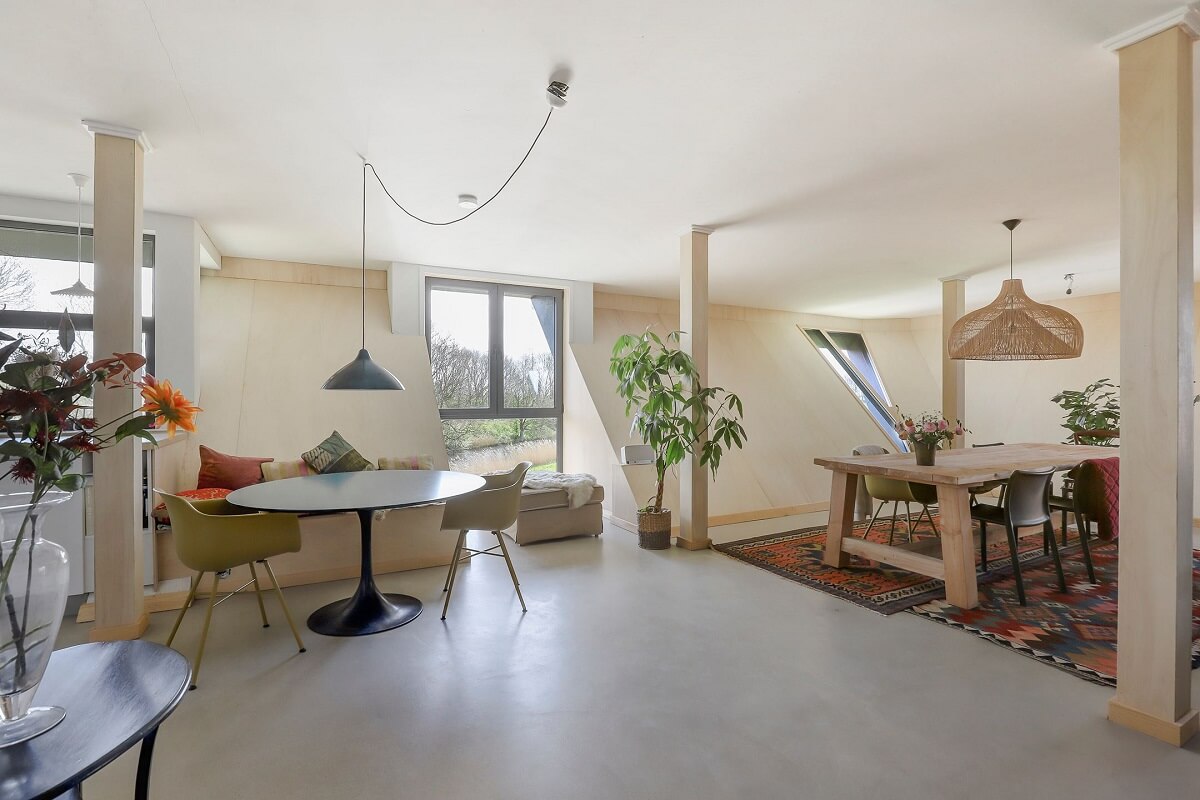 A Unique Upside Down House in The Netherlands 8 open-plan-living-space-slanted-ceiling-nordroom