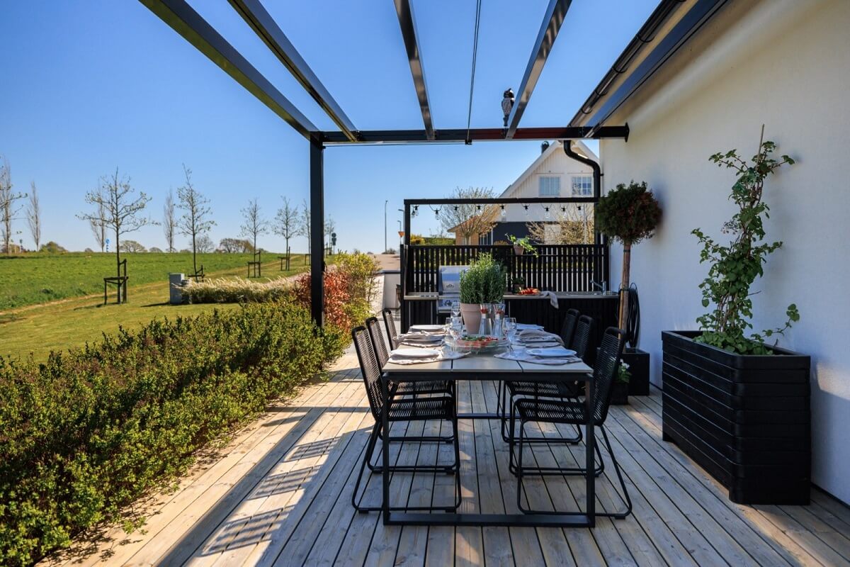 A Monochrome Swedish Villa with High Ceilings 28 outdoor-dining-space-swedish-villa-nordroom