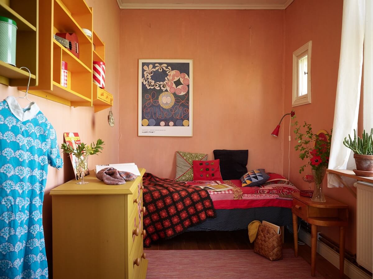 A Vintage Colorful Family Home in the Swedish Countryside 19 pink-bedroom-yellow-desser-cabinets-nordroom