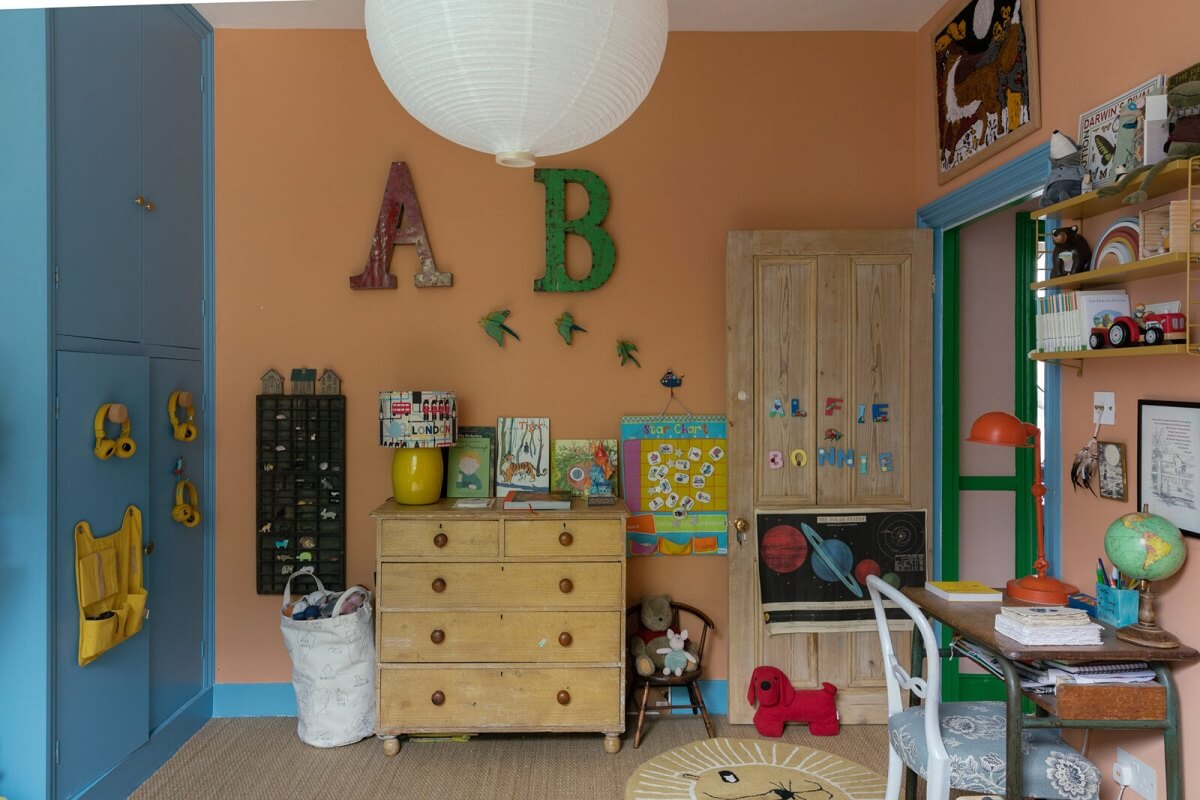Colorful Rooms in a Family Home in London 19 pink-kids-bedroom-blue-wardrobe-desk-nordroom