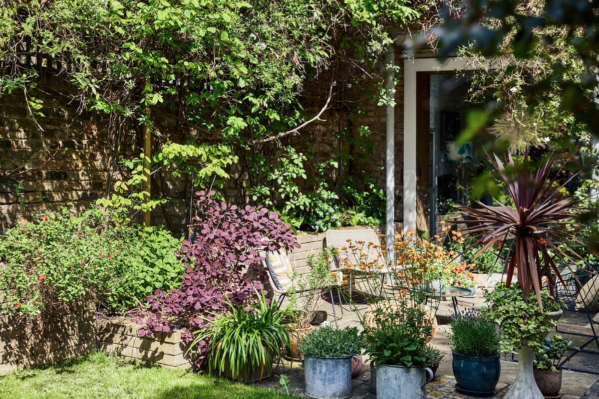 A Light Victorian Townhouse with Teal Reading Room 23 plant-filled-garden-london-townhouse-nordroom