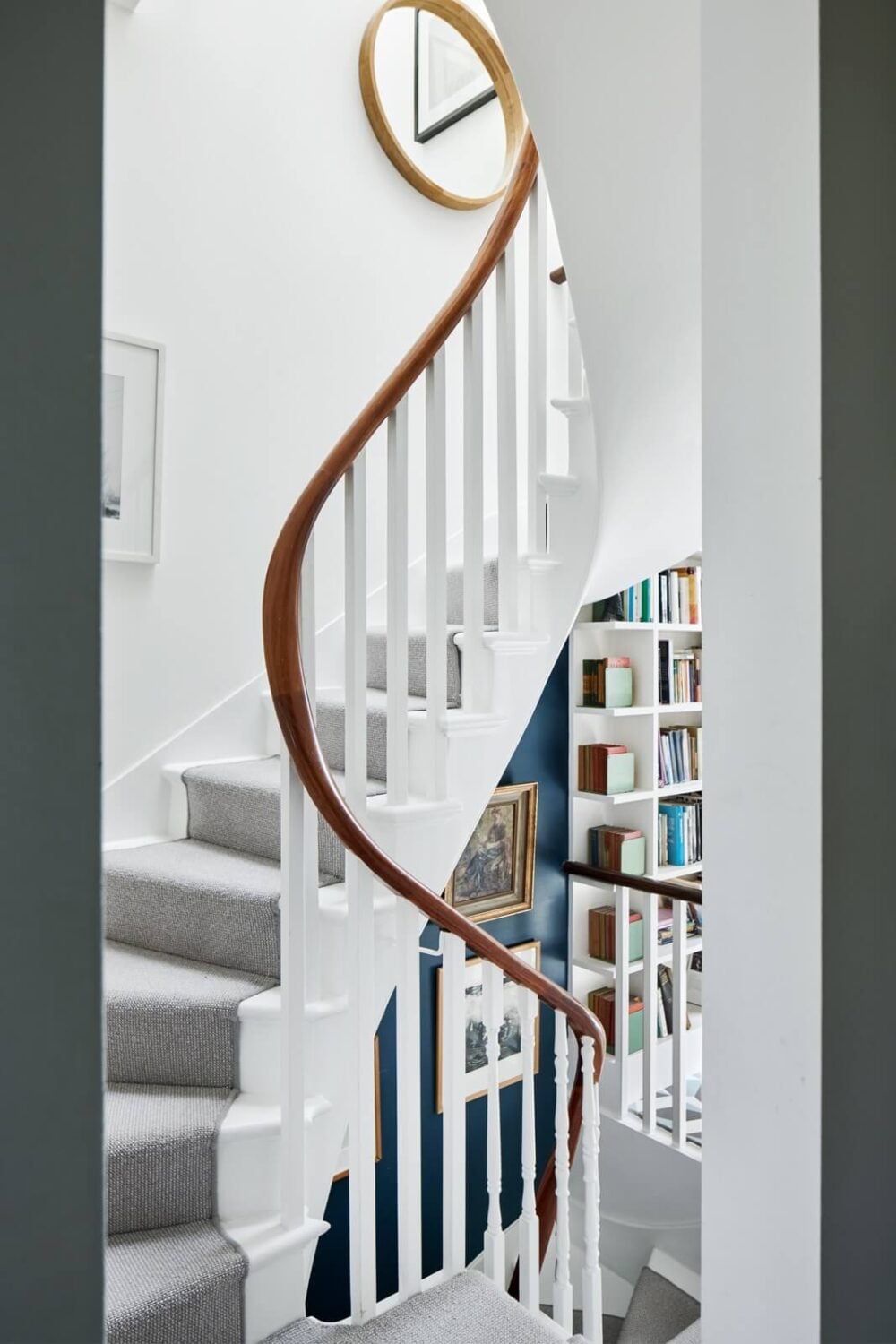 A Light Victorian Townhouse with Teal Reading Room 11 round-staircase-victorian-townhouse-london-nordroom