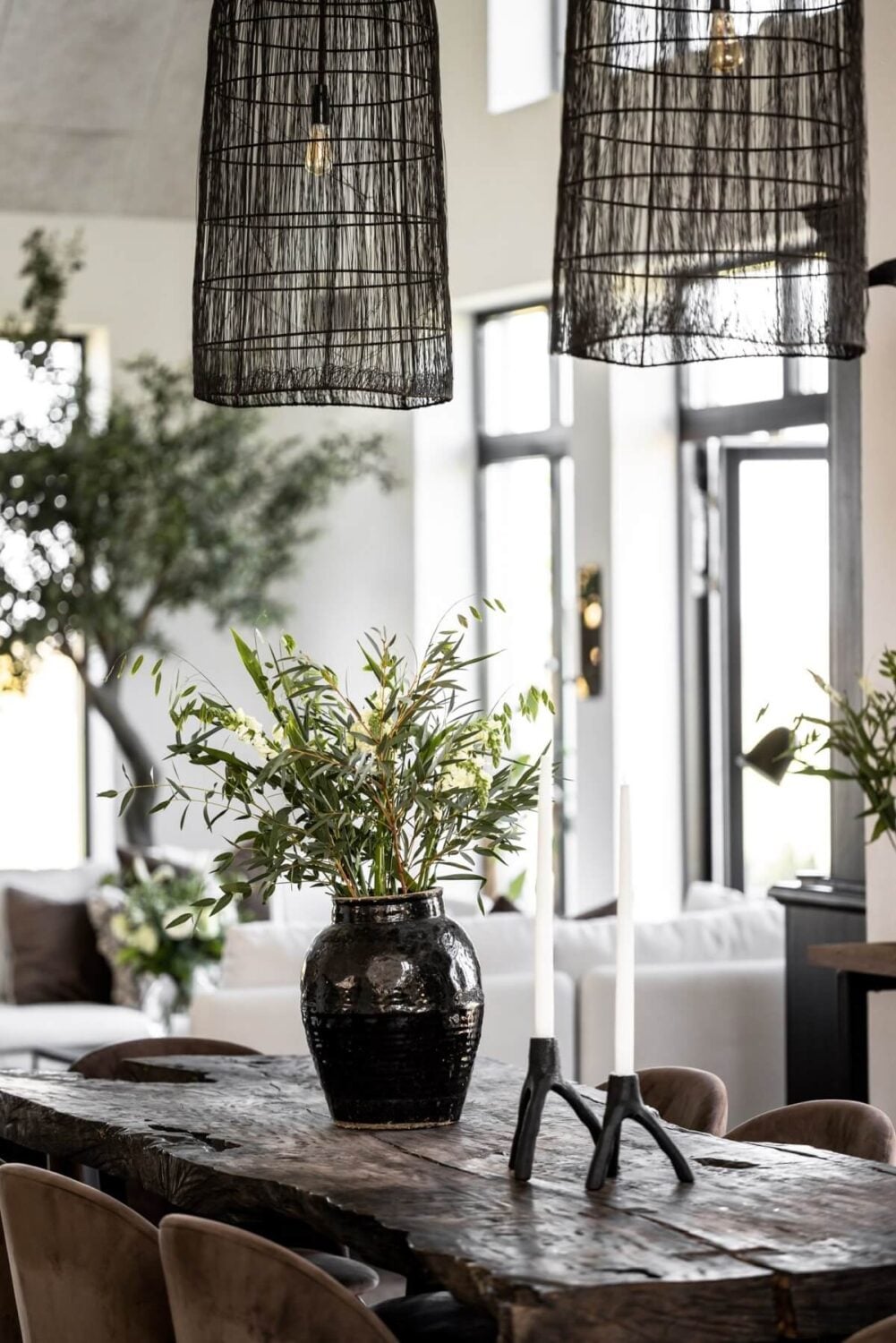 A Monochrome Swedish Villa with High Ceilings 11 rustic-wooden-dining-table-monochrome-swedish-villa-nordroom