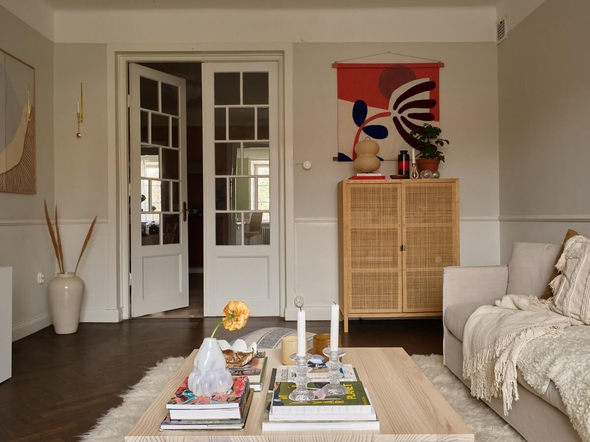 A Scandinavian Apartment with a Light Green Bedroom 4 scandinavian-living-room-light-gray-walls-ikea-cabinet-nordroom