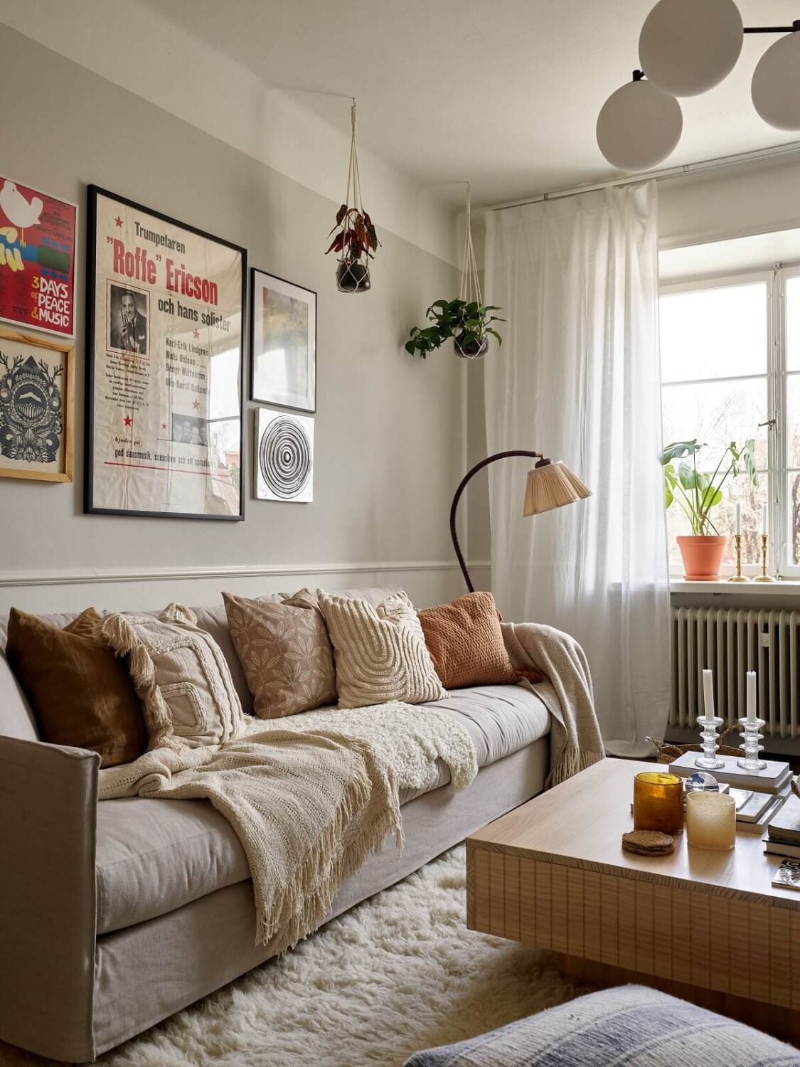 These Paint Colors Increase The Value of Your Home 14 scandinavian-living-room-light-gray-walls-square-coffee-table-nordroom