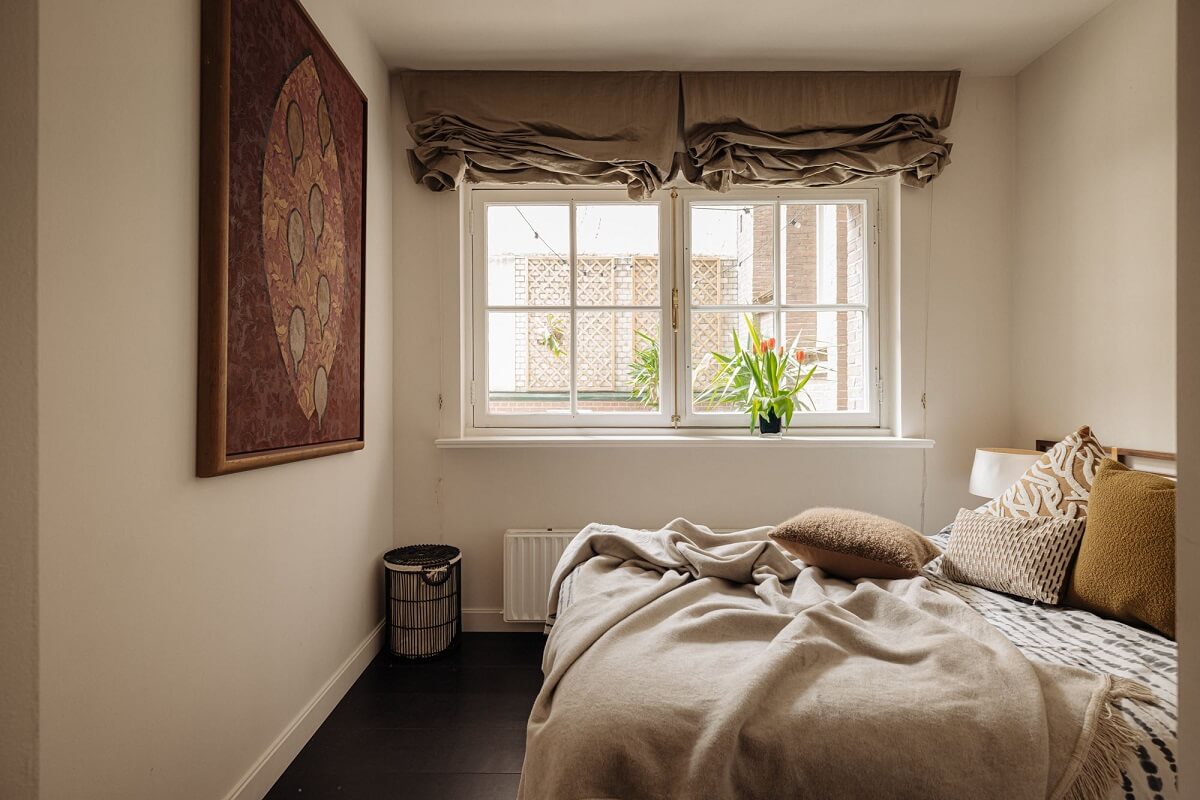 A Luxurious Duplex Apartment in Amsterdam 18 serene-bedroom-warm-accents-wooden-floor-duplex-amsterdam-nordroom