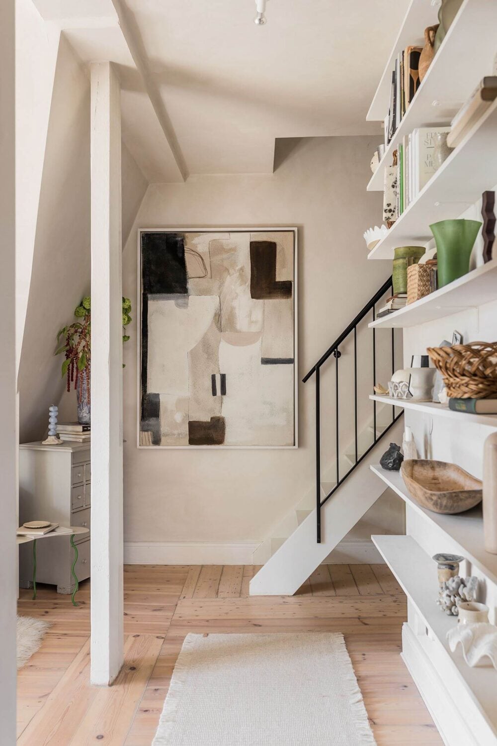 A Charming Attic Apartment with High Ceilings 10 shelves-hallway-nordic-attic-apartment-nordroom