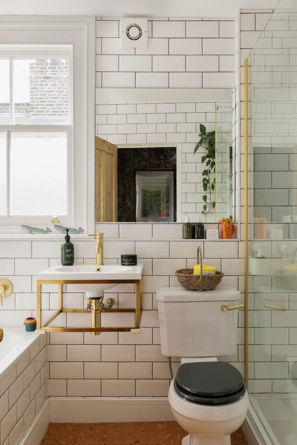 Colorful Rooms in a Family Home in London 20 small-bathroom-white-subway-tiles-brass-fittings-nordroom