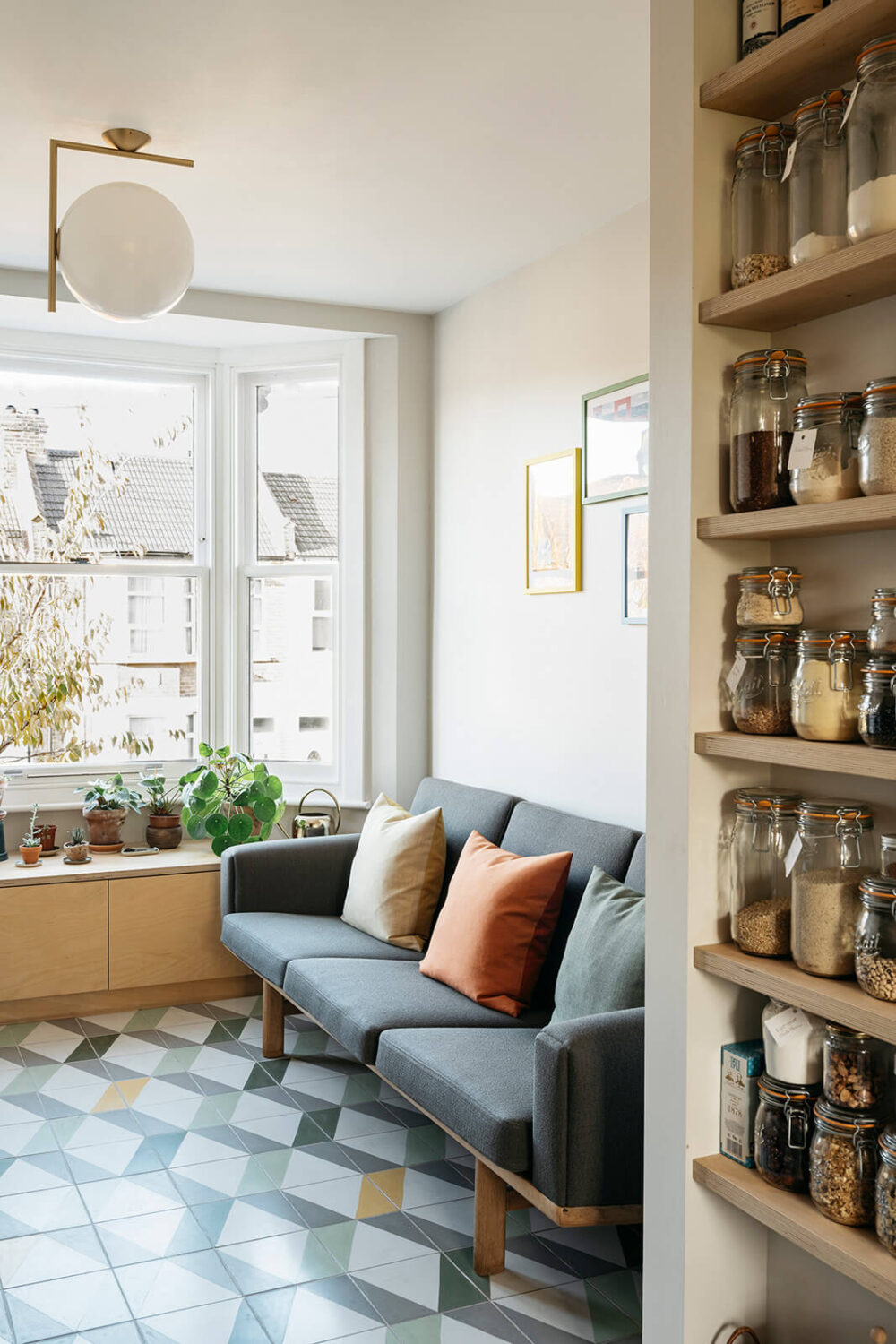 Modern Custom Interiors in a Victorian Home 10 small-living-room-floor-tiles-shelves-nordroom