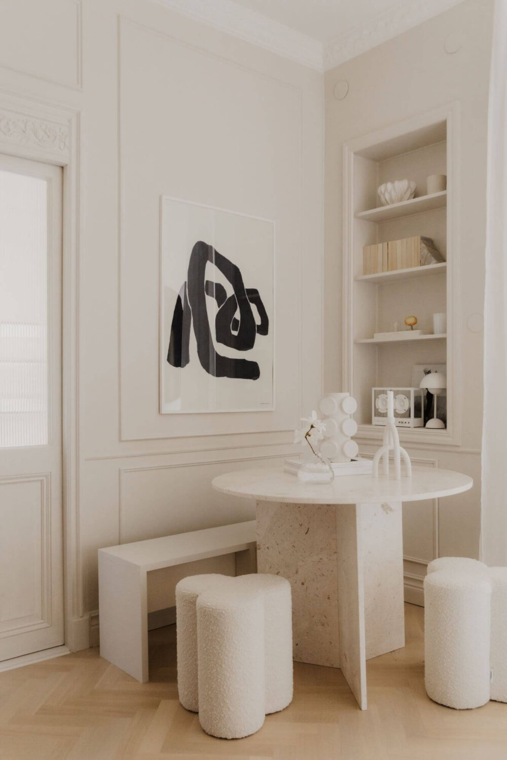 A Small Beige Apartment with Niches and Built-in Storage 4 small-round-dining-table-stools-nordroom