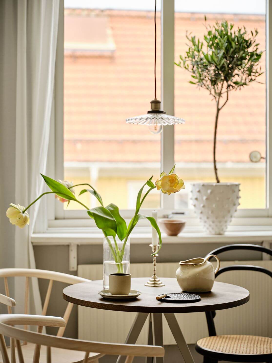 A Warm Beige Studio Apartment in Sweden 13 small-round-dining-table-studio-nordroom