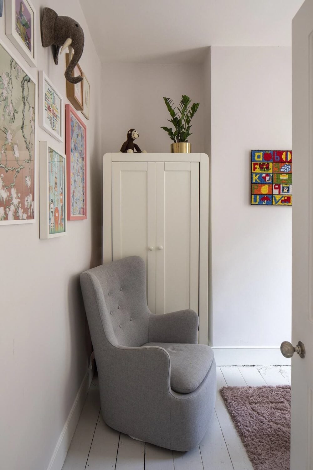 Muted Natural Colors in a Victorian House 16 small-white-baby-room-gray-chair-nordroom