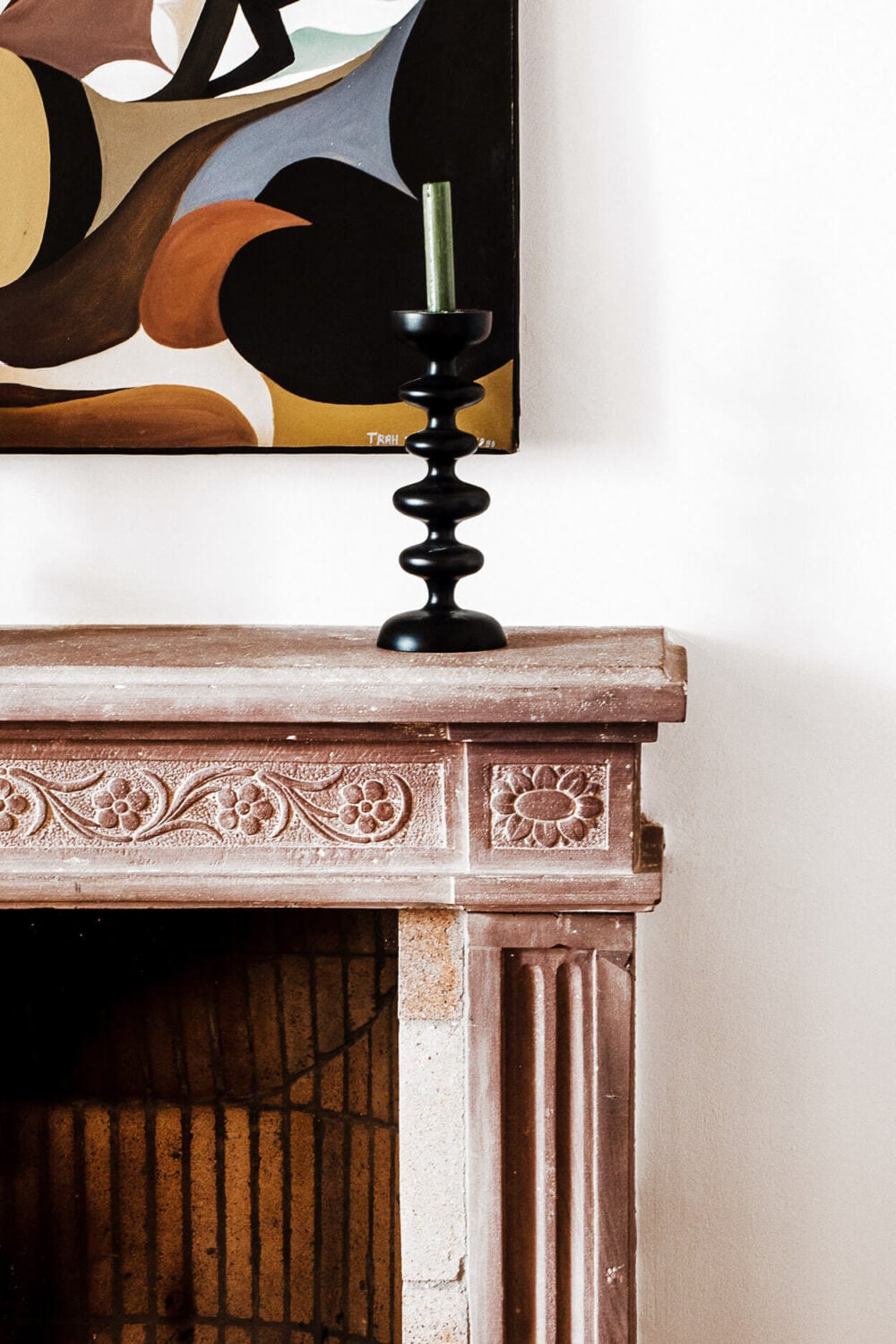 A Renovated Historic Townhouse on Mallorca 7 stone-fireplace-decor-detail-nordroom
