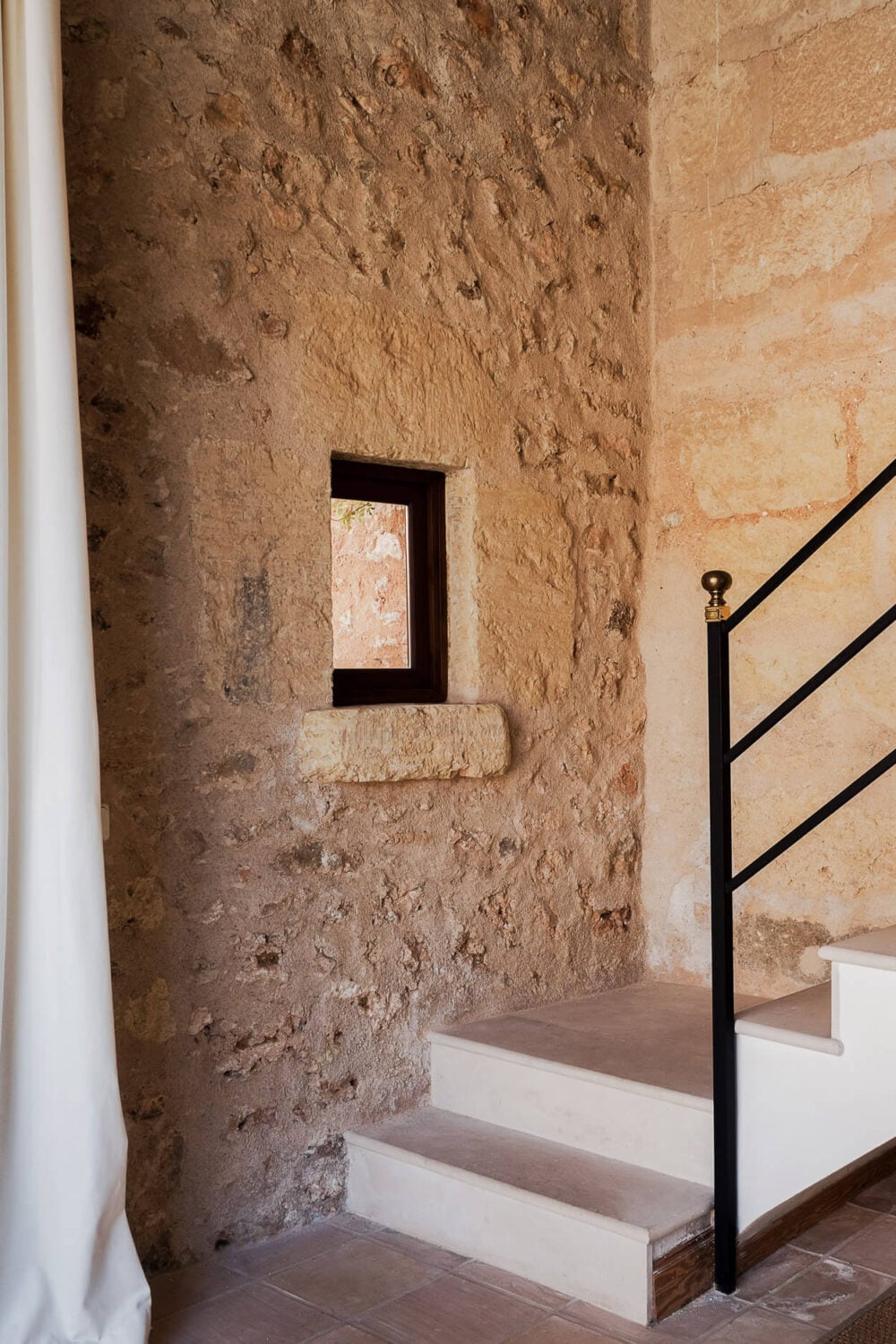 A Renovated Historic Townhouse on Mallorca 17 stone-wall-historic-townhouse-mallorca-nordroom