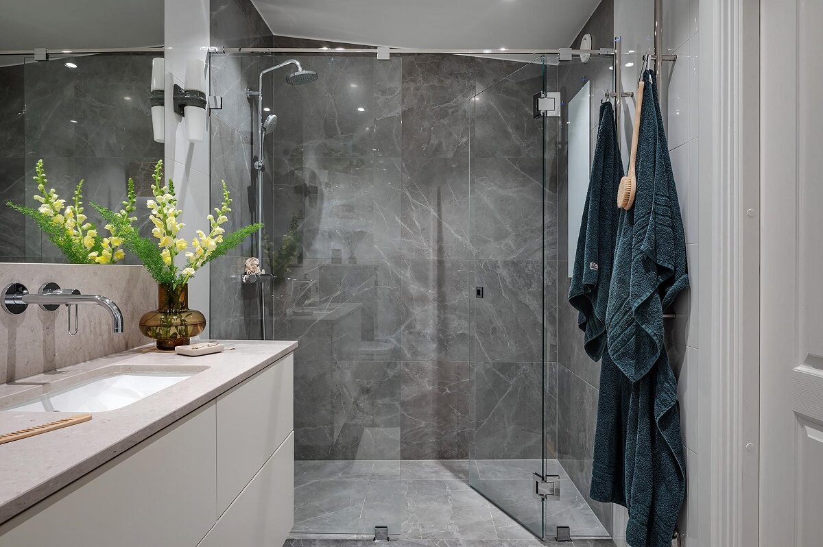 A Modern Scandinavian Attic Apartment 30 walk-in-shower-gray-tiles-nordroom