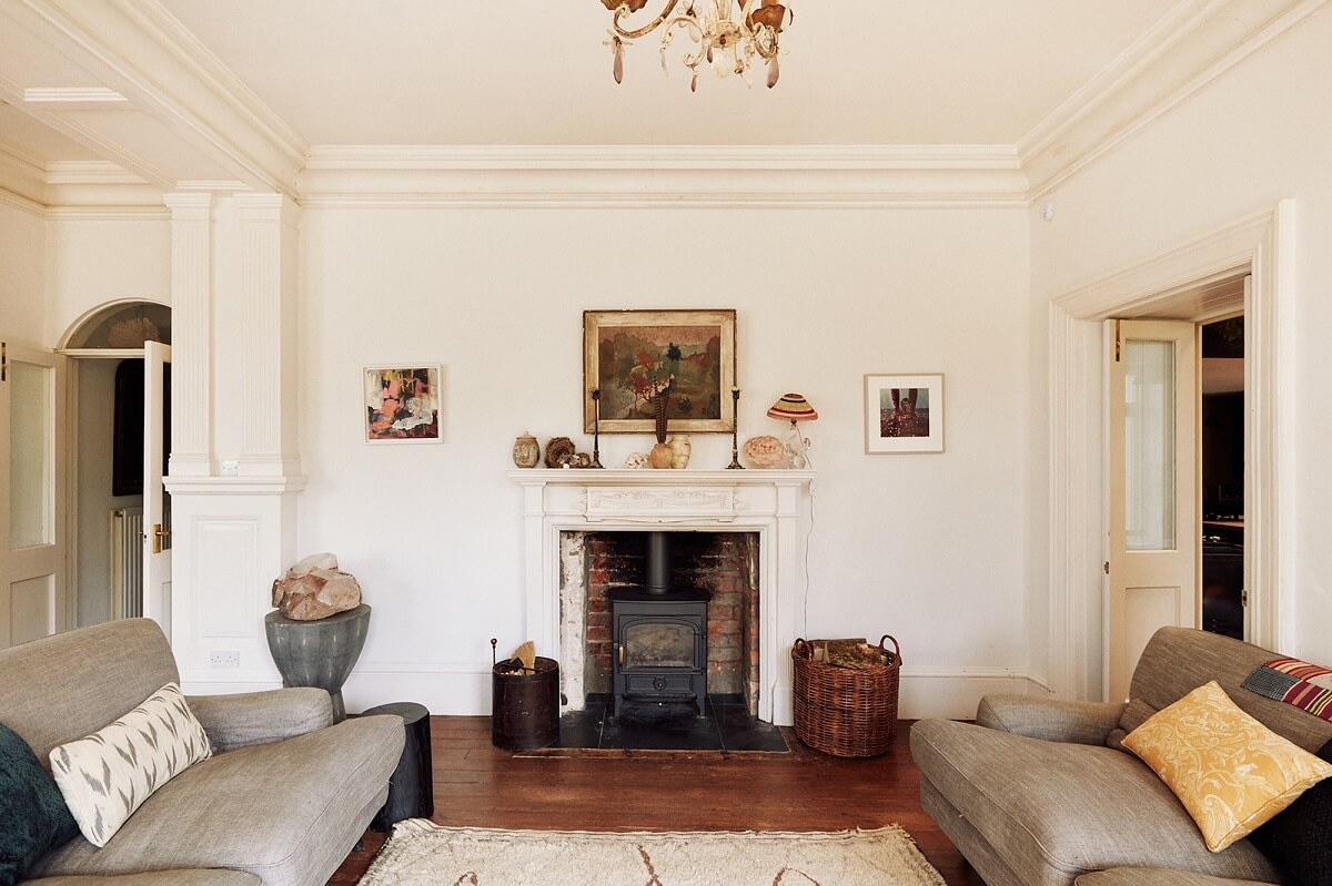 A Spectacular Kitchen in a Historic English House 8 white-living-room-double-facing-sofa-fireplace-nordroom
