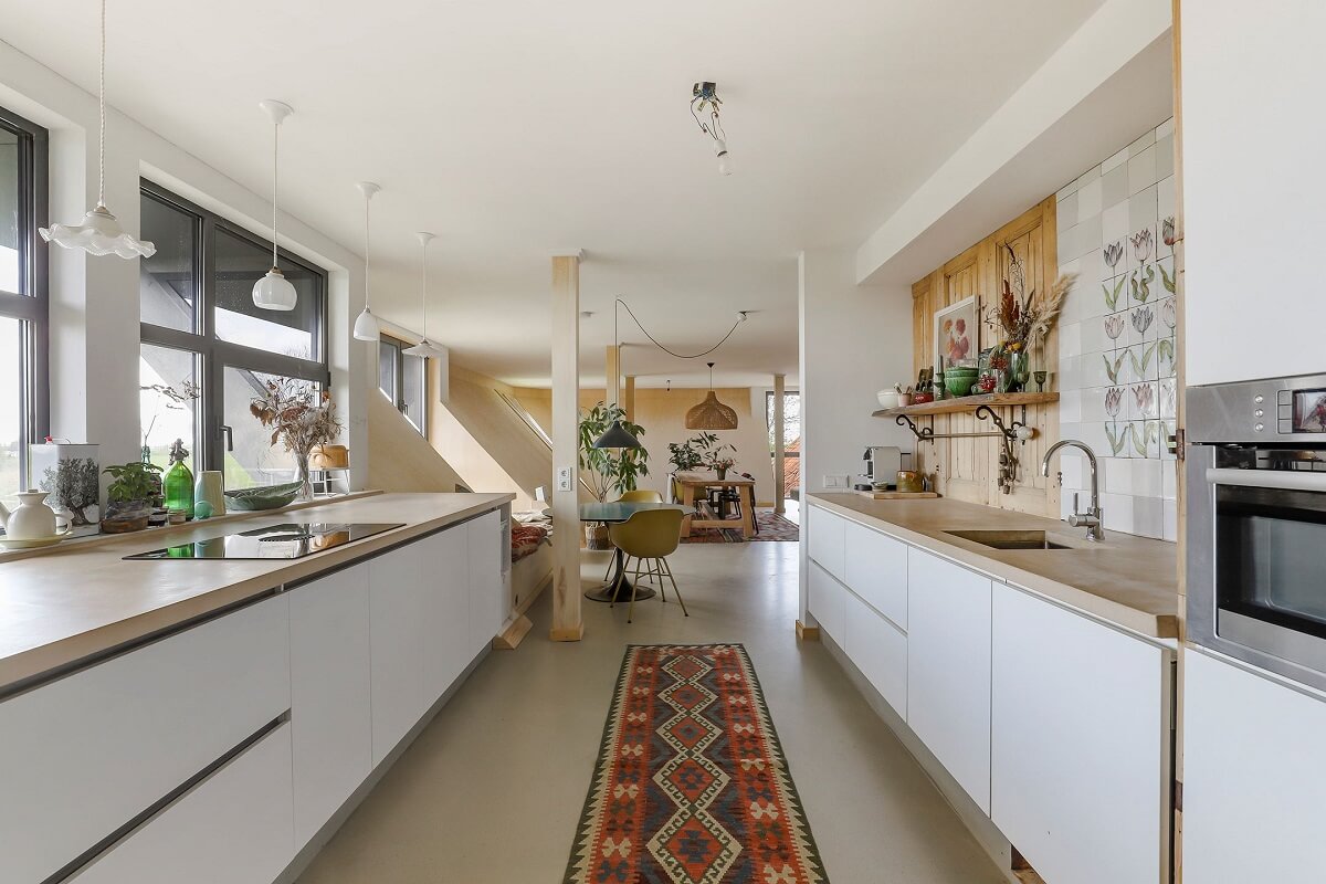 A Unique Upside Down House in The Netherlands 12 white-modern-kitchen-galley-upside-down-house-nordroom