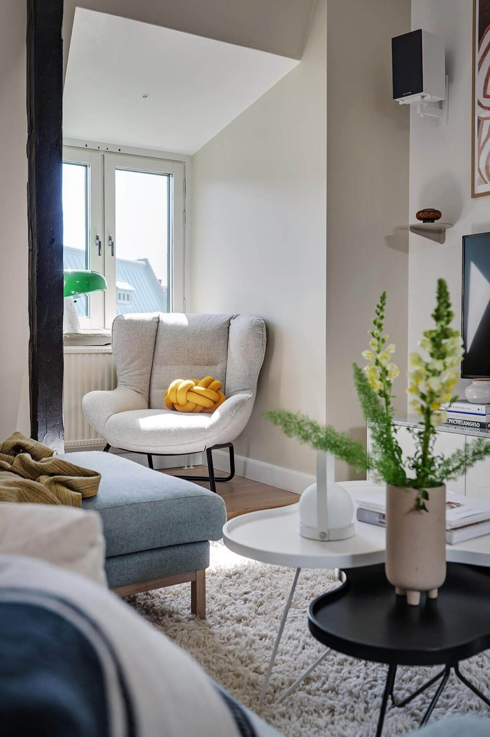 A Modern Scandinavian Attic Apartment 12 window-seat-reading-nook-modern-nordic-attic-apartment-nordroom