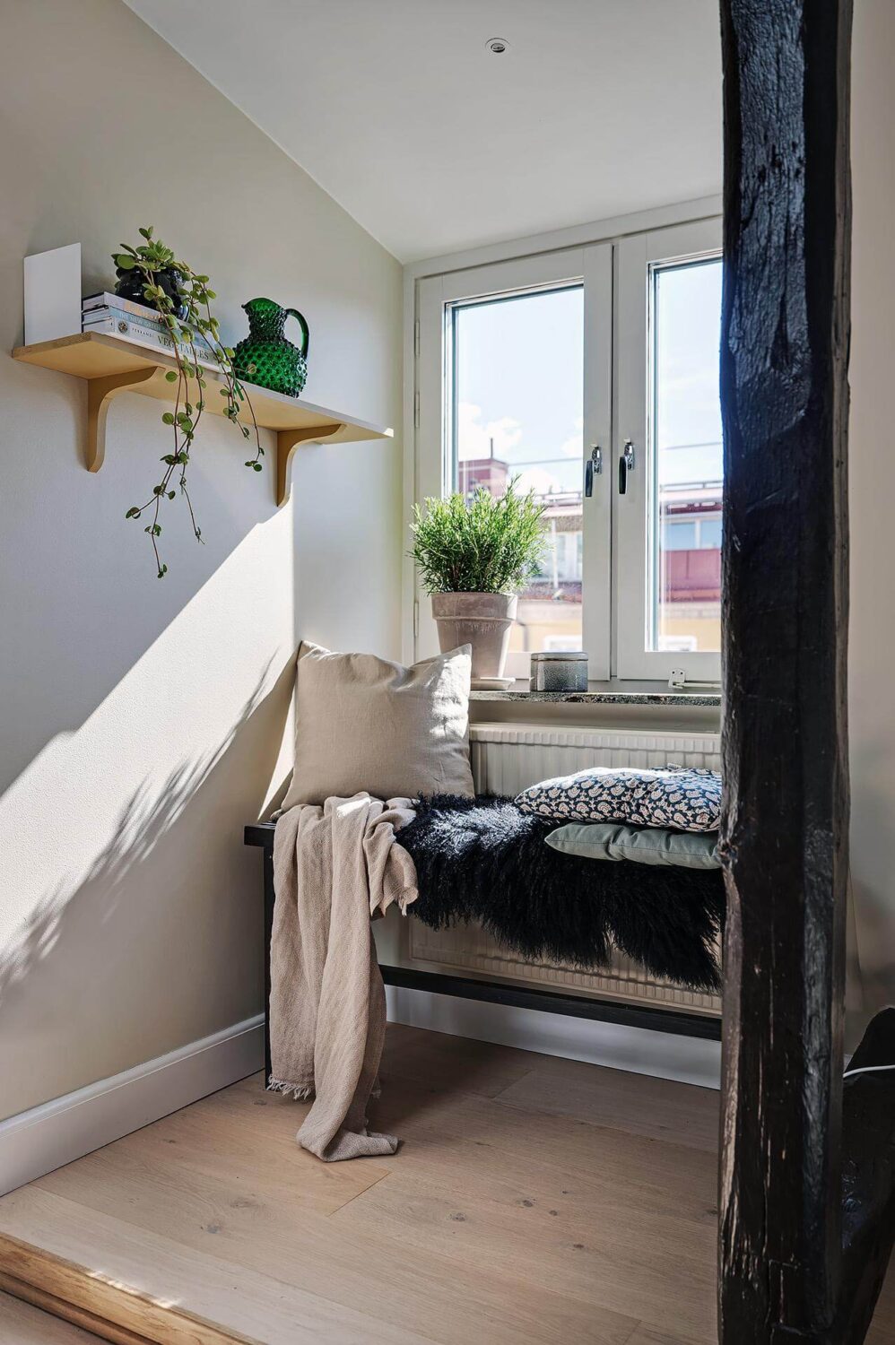 A Modern Scandinavian Attic Apartment 6 window-seat-scandinavian-attic-apartment-nordroom