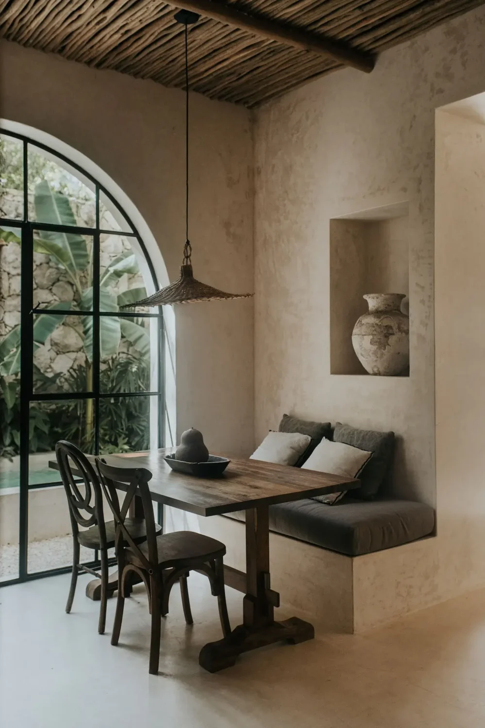 Rustic Wooden Elements in a Stylish Tulum Airbnb 12 wooden-dining-table-built-in-bench-wooden-ceiling-airbnb-home-tulum-nordroom