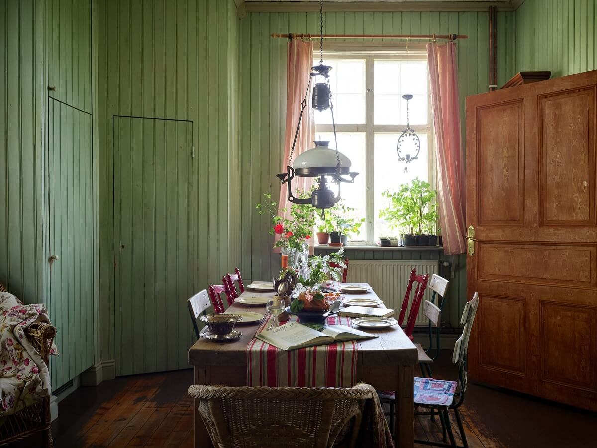 A Vintage Colorful Family Home in the Swedish Countryside 10 wooden-dining-table-green-kitchen-colorful-family-house-nordroom