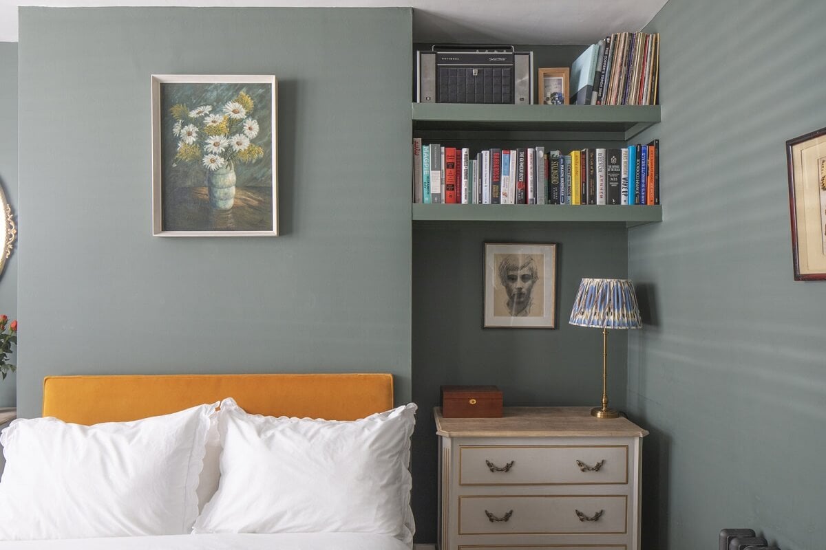 Muted Natural Colors in a Victorian House 11 yellow-headboard-green-bedroom-niche-bookshelves-nordroom