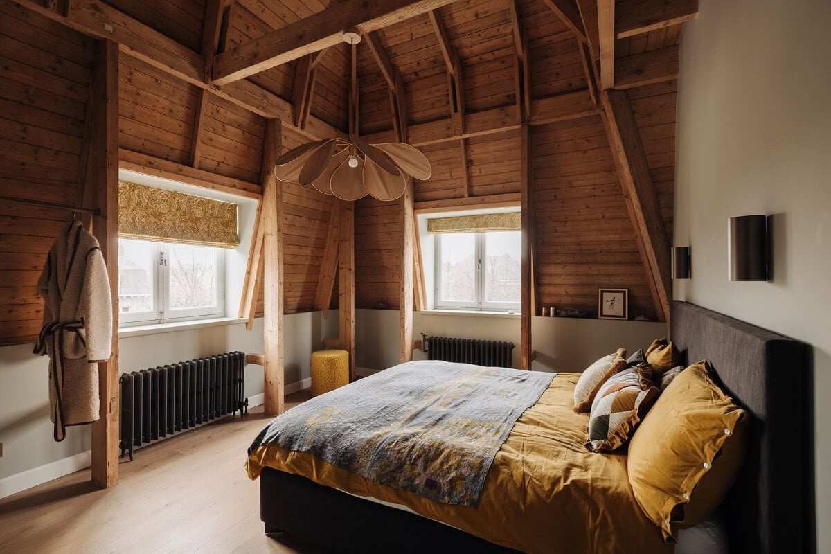 A Grand Renovated Family Home in Amsterdam 26 attic-bedroom-slanted-wooden-ceiling-nordroom
