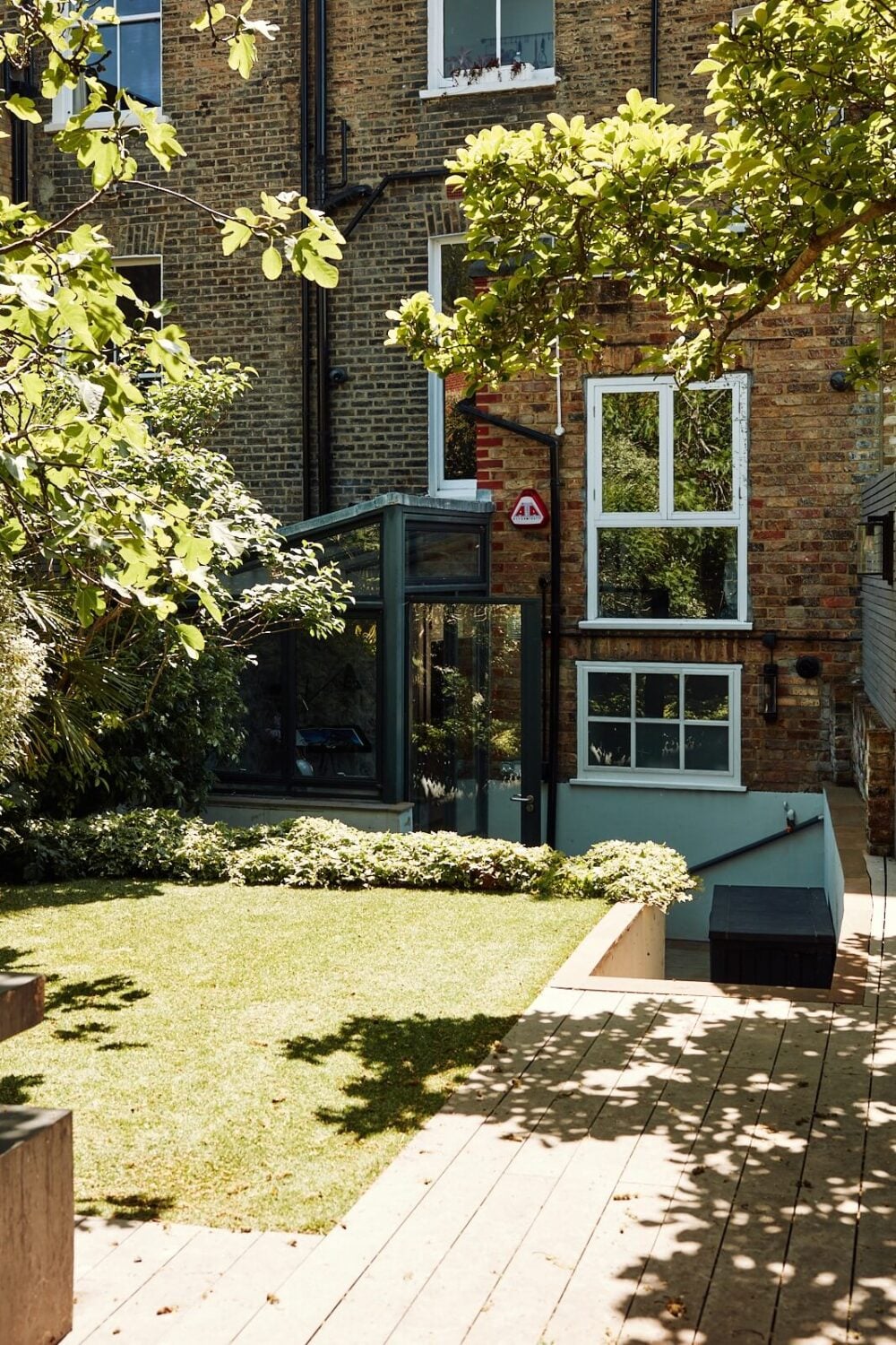 A Pink Living Room in a London Maisonette 24 back-garden-lawn-nordroom
