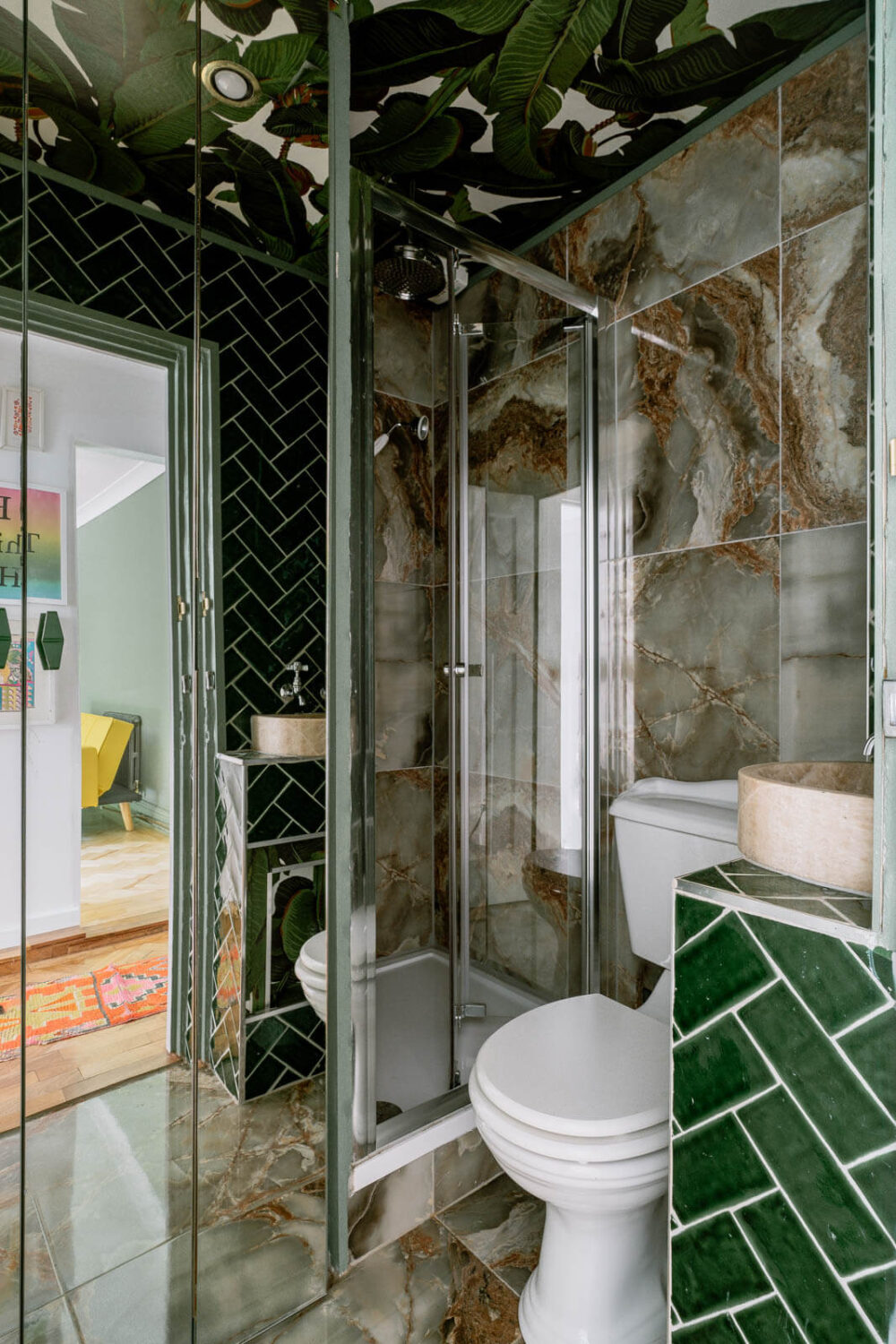 A London Home with Color Accents and a Secret Garden Shed 14 bahtroom-glossy-green-tiles-banana-leaf-wallpaper-ceiling-nordroom