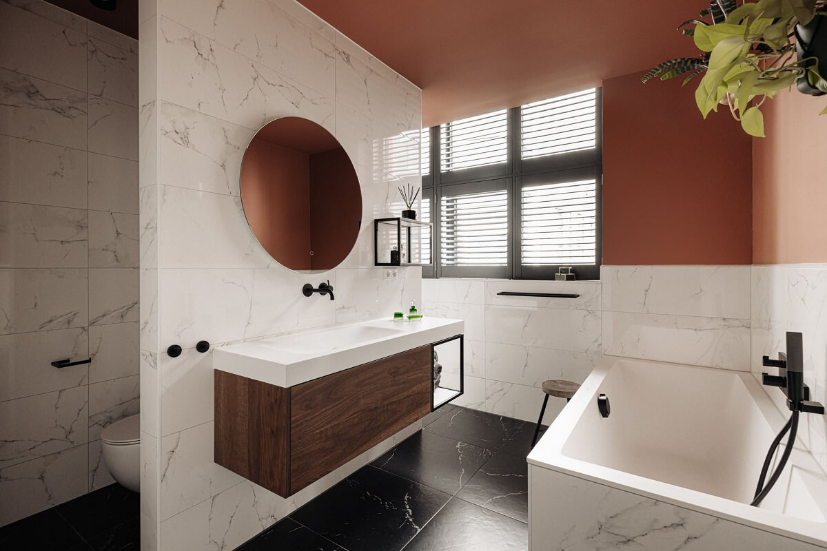 An Industrial Loft Home in Amsterdam 18 bathroom-earthy-pink-walls-round-mirror-nordroom