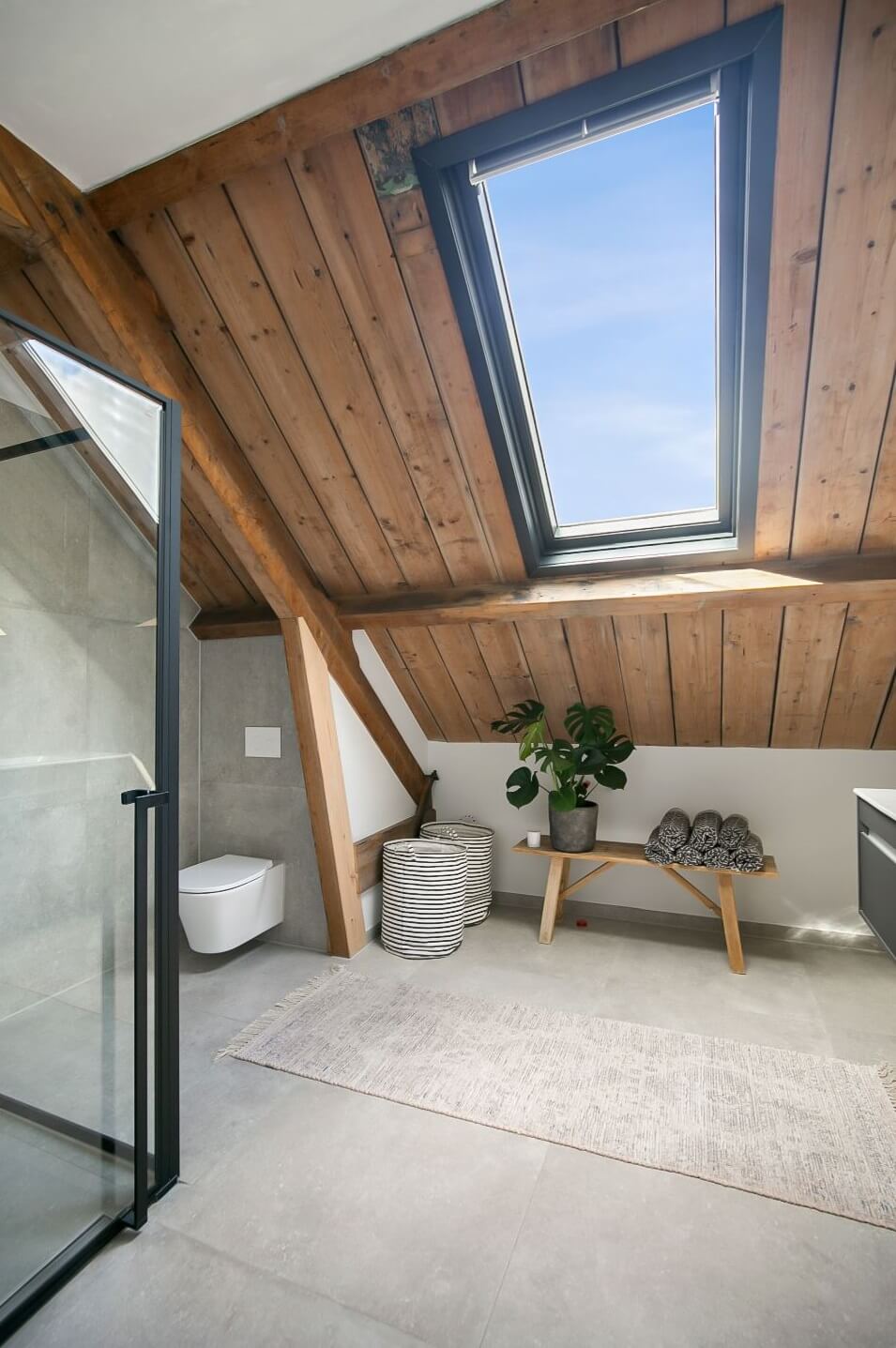 A Dutch Barn House with Brick Floors and Wooden Ceilings 18 bathroom-slanted-wooden-ceiling-nordroom