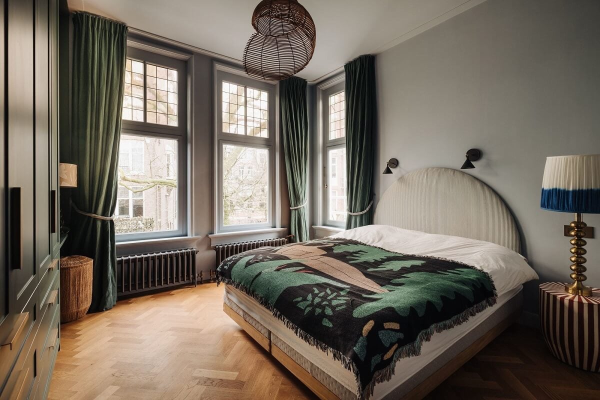 A Grand Renovated Family Home in Amsterdam 14 bedroom-light-blue-walls-green-curtains-nordroom