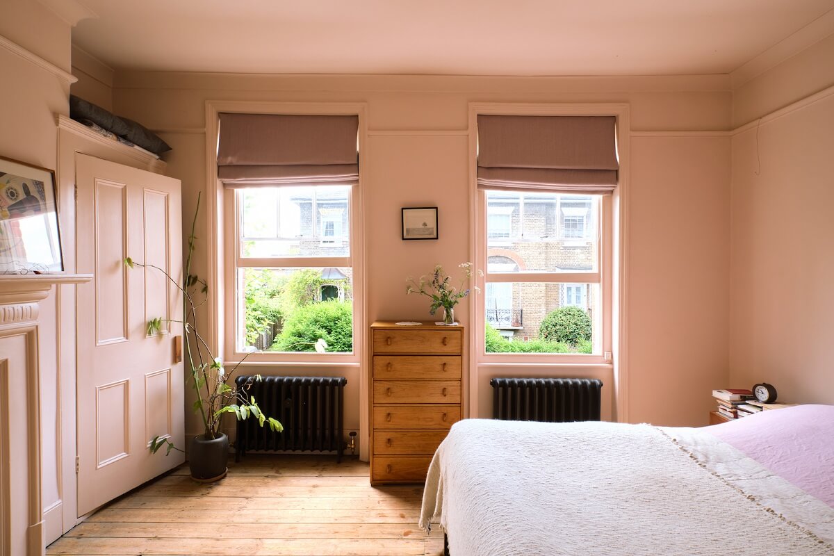 Bold Colors and Historic Details in a Victorian Apartment 13 bedroom-pink-walls-ceiling-farrow-ball-setting-plaster-nordroom