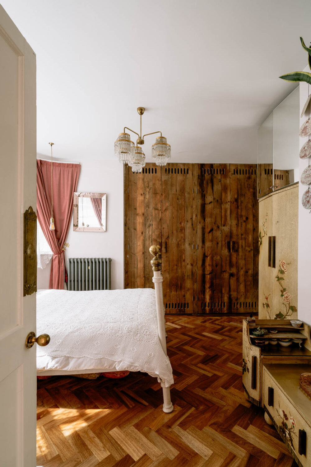 A London Home with Color Accents and a Secret Garden Shed 10 bedroom-wooden-floor-built-in-wardrobes-pink-curtains-nordroom