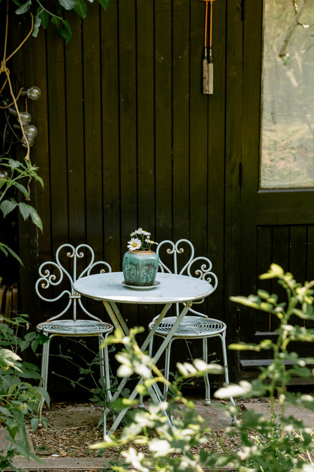 A London Home with Color Accents and a Secret Garden Shed 25 bistro-seating-garden-london-nordroom