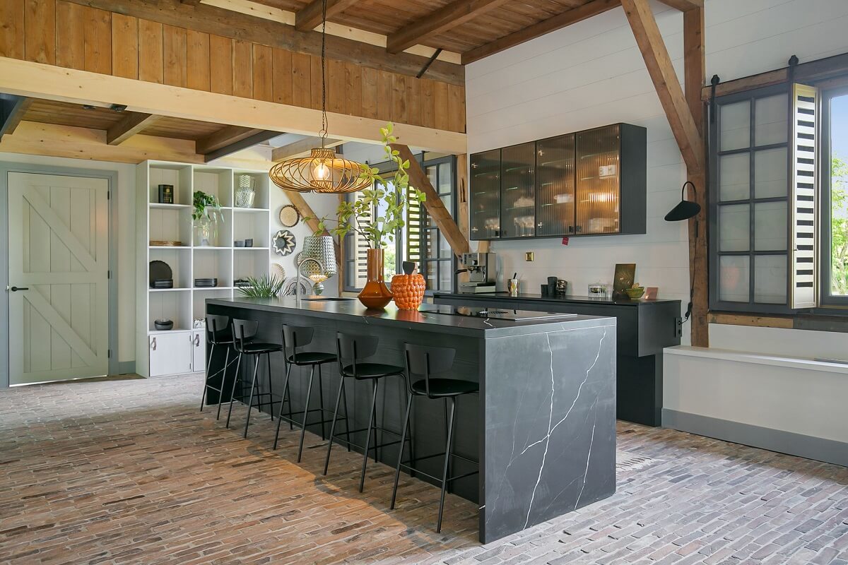 A Dutch Barn House with Brick Floors and Wooden Ceilings 10 black-marble-kitchen-island-wooden-ceiling-nordroom