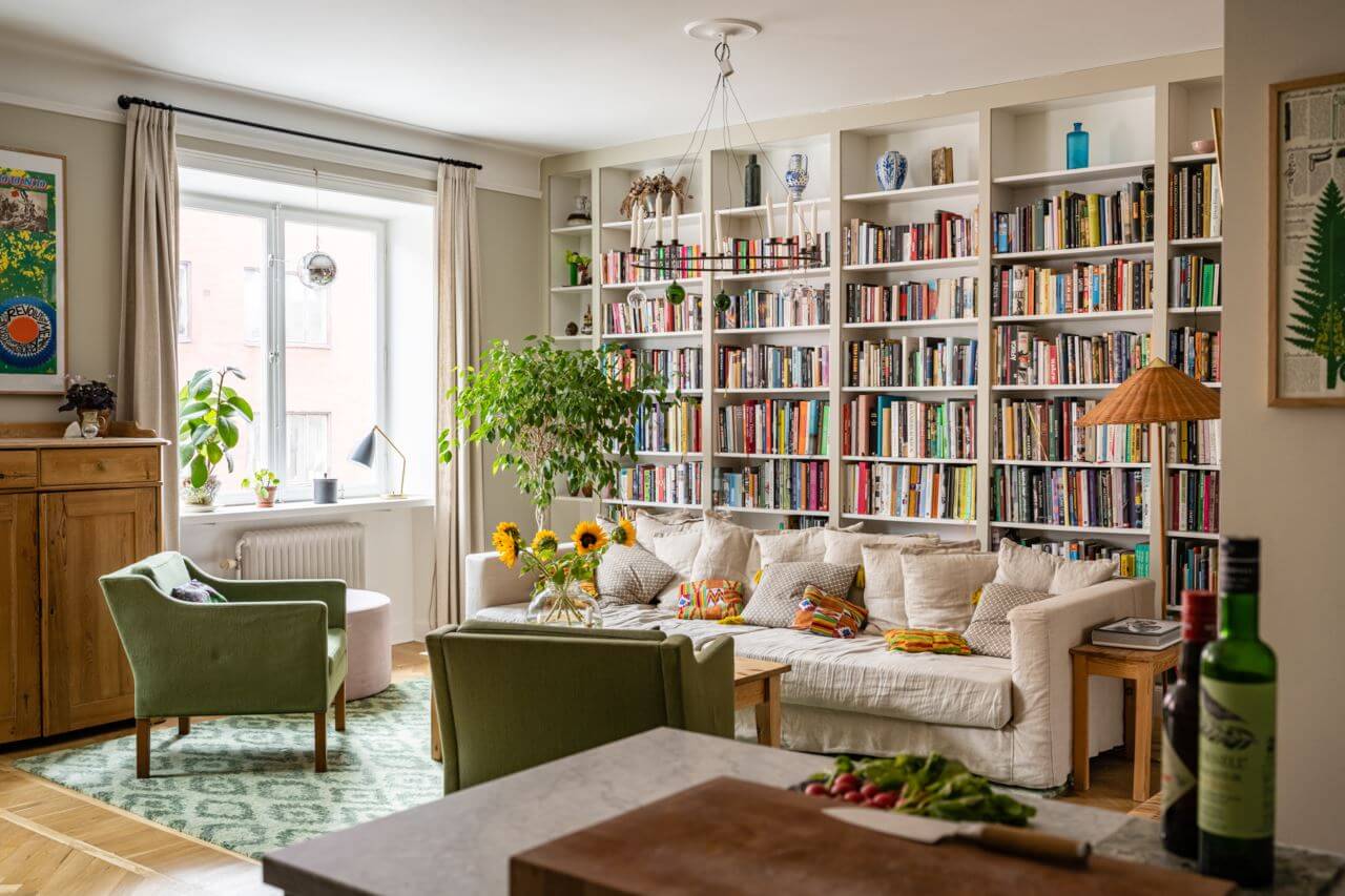 Green Color Accents in a Beautiful Historic Apartment 5 bookshelves-living-room-sofa-armchairs-nordroom