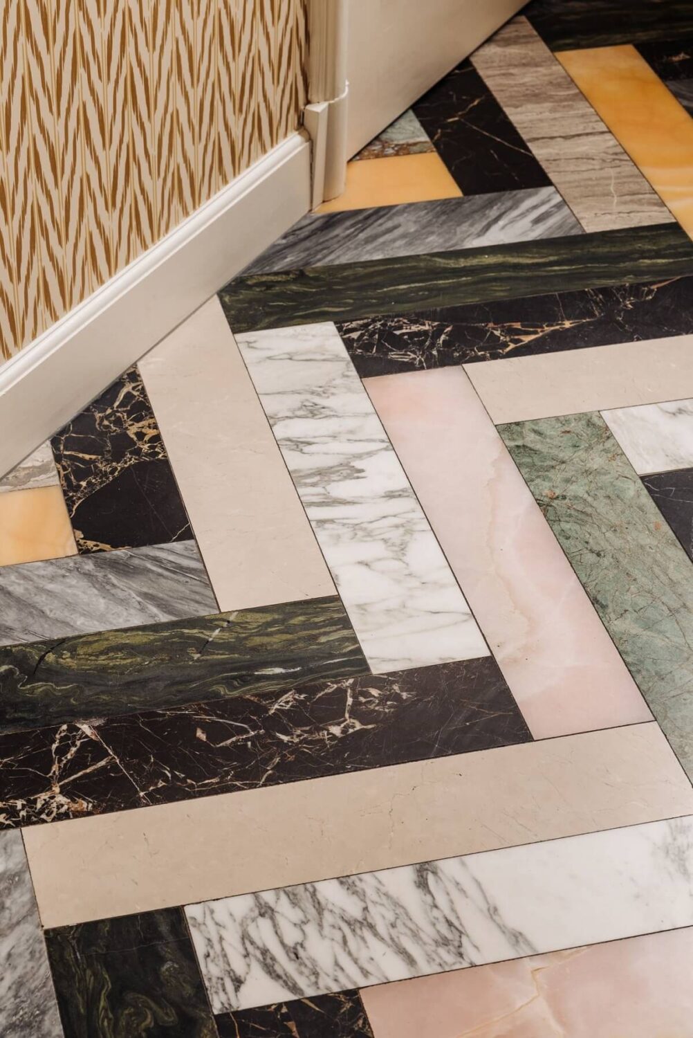 A Grand Renovated Family Home in Amsterdam 12 colorful-marble-tile-floor-herringbone-pattern-nordroom