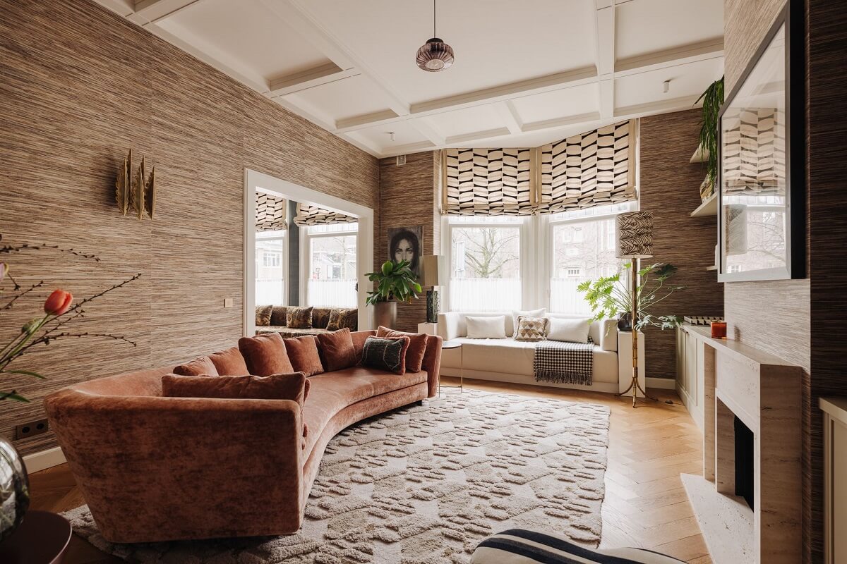 A Grand Renovated Family Home in Amsterdam 8 curved-couch-sitting-room-wallpaper-nordroom
