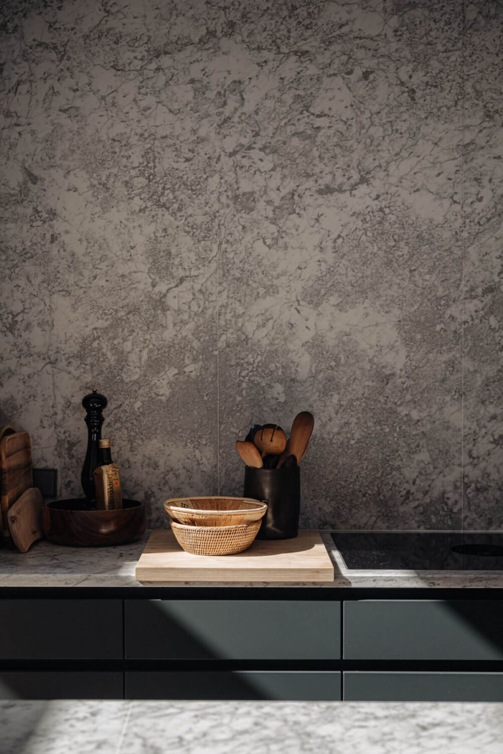 A Monochrome Duplex Apartment in Amsterdam 9 dark-gray-kitchen-cabinets-marble-countertop-nordroom
