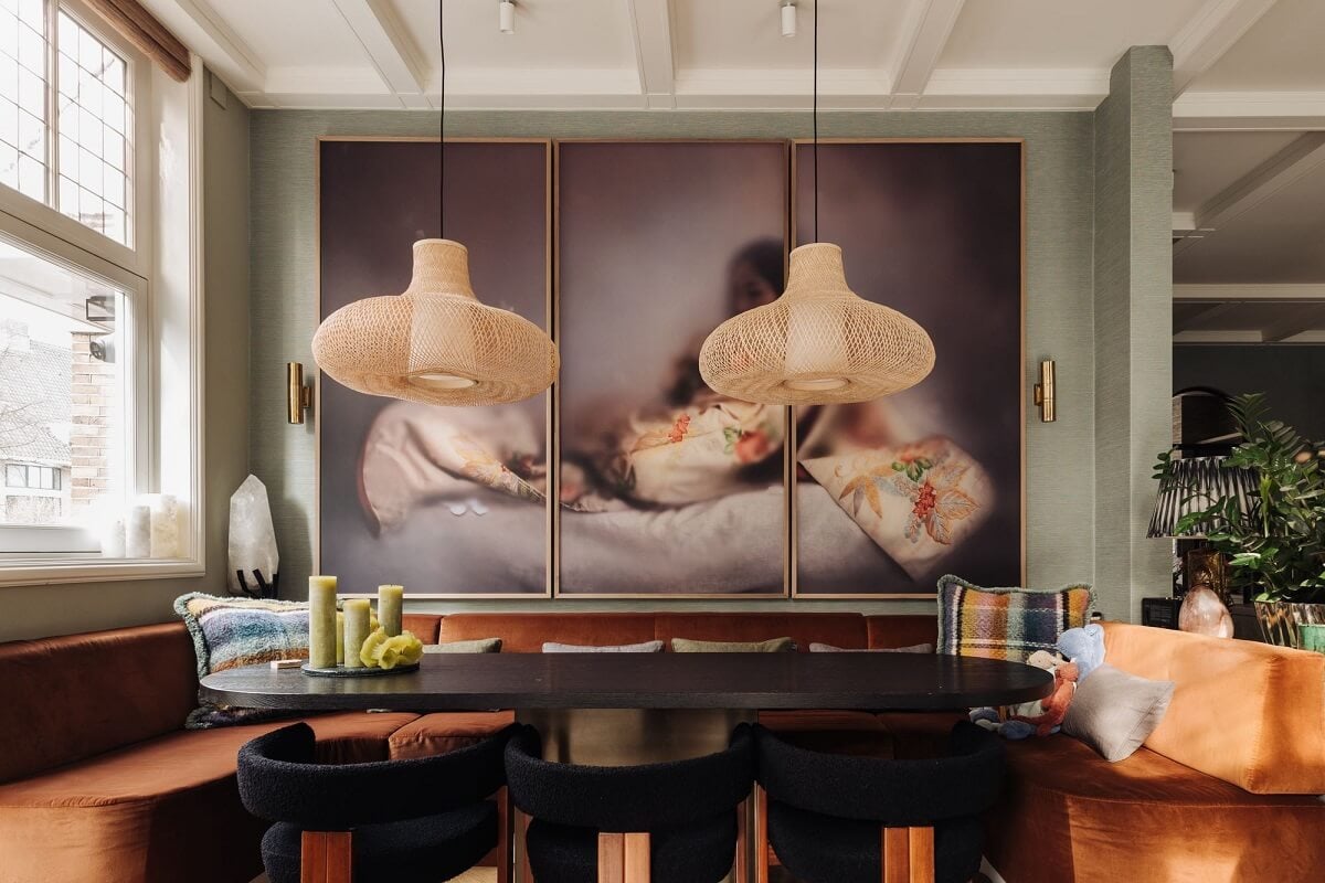 A Grand Renovated Family Home in Amsterdam 5 dining-room-large-artwork-built-in-dining-bench-nordroom