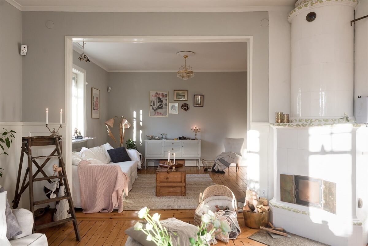 Natural Light in a Family Home in Sweden 1 double-living-room-light-colors-fireplace-natural-light-nordroom