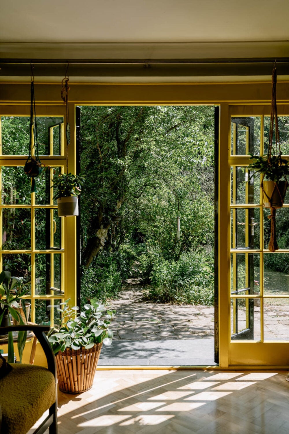 A London Home with Color Accents and a Secret Garden Shed 5 double-yellow-doors-garden-ground-floor-apartment-london-nordroom