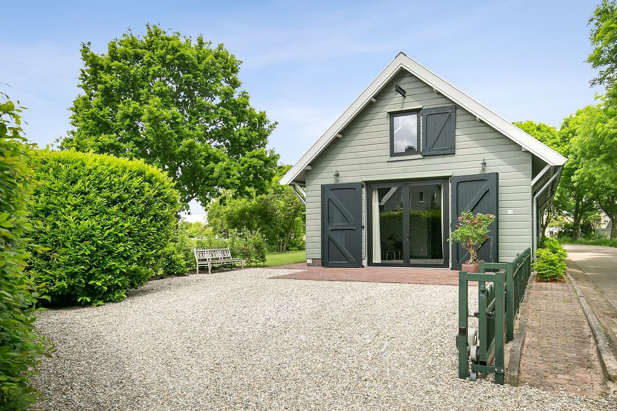 A Dutch Barn House with Brick Floors and Wooden Ceilings 26 exterior-barn-house-netherlads-nordroom