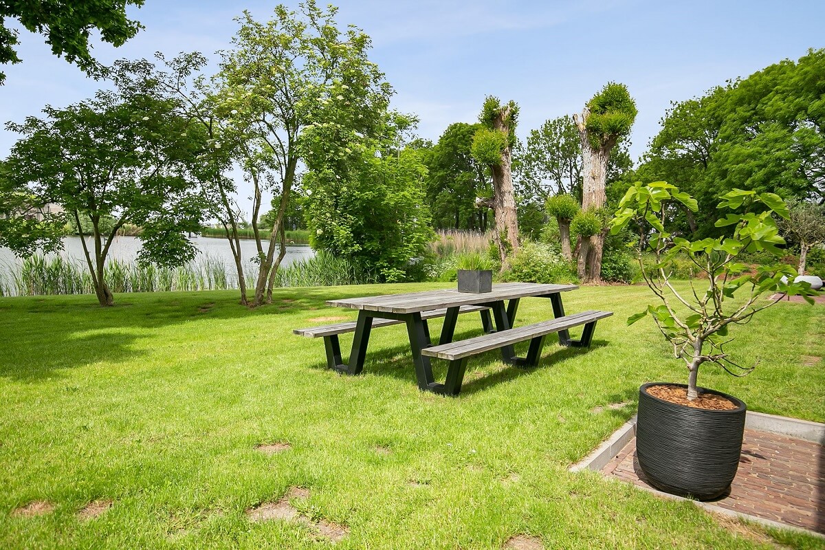 A Dutch Barn House with Brick Floors and Wooden Ceilings 24 garden-lake-barn-house-holland-nordroom