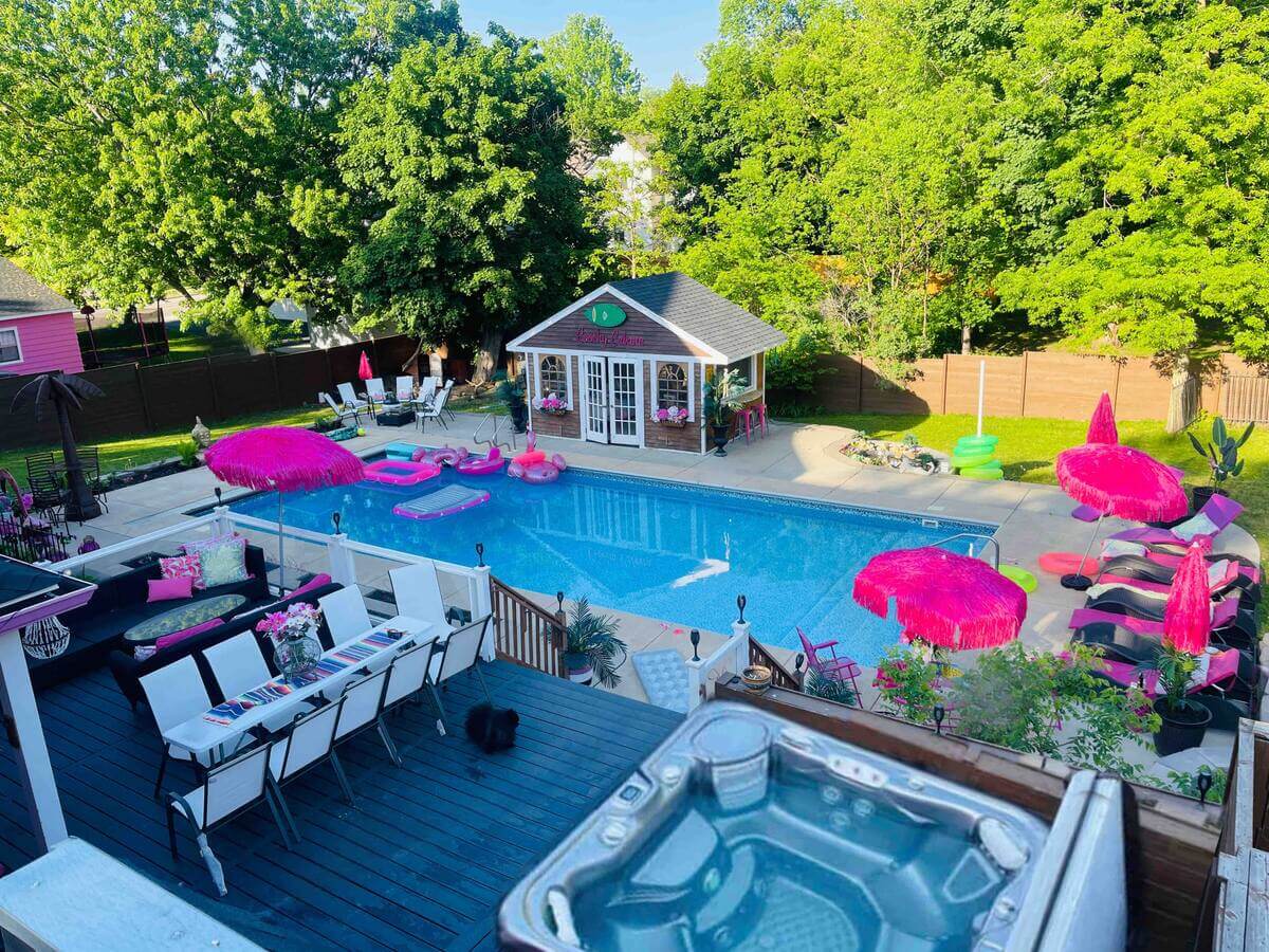 Barbiecore Interiors: The New Colorful & Fun Design Trend 23 garden-swimming-pool-hot-pink-accessories-barbiecore-nordroom